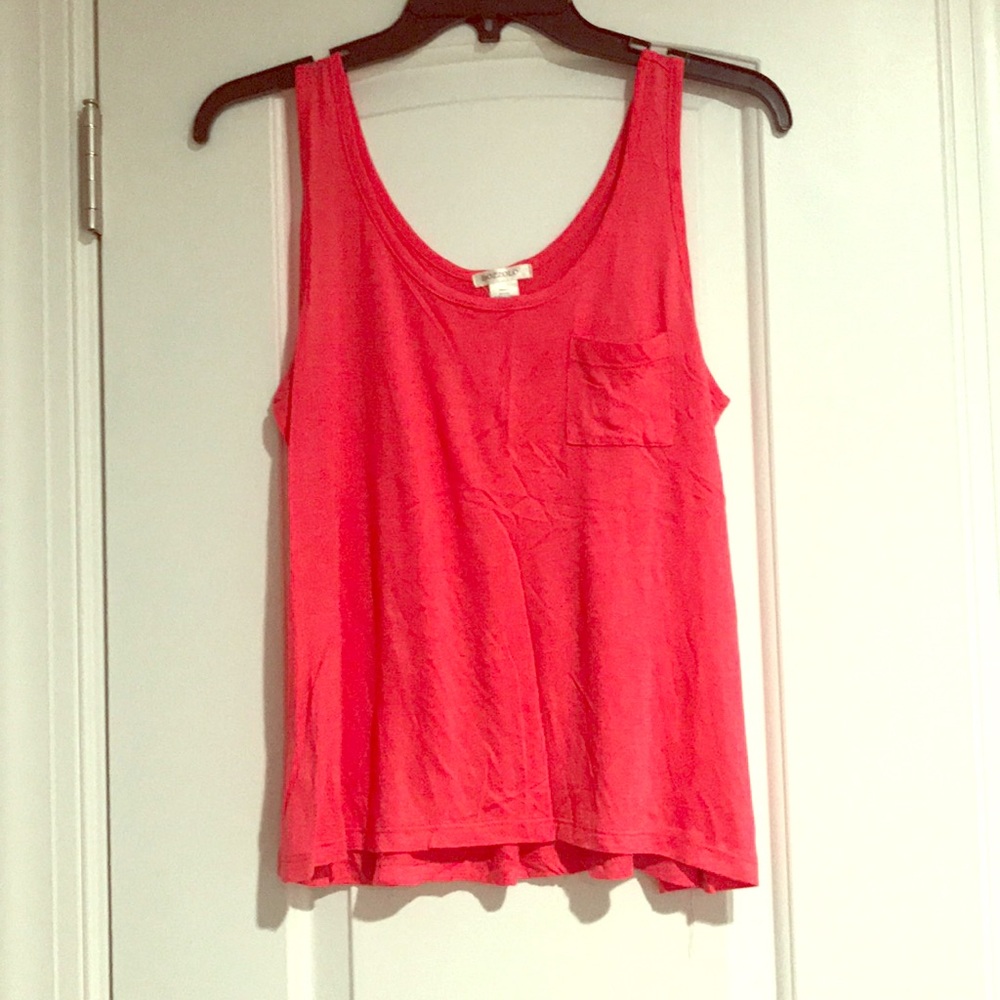Coral/pink front pocket tank with back detail.